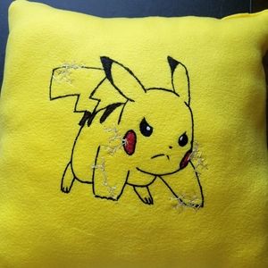 Hand Sew Pillow with Pikachu on one side and other side pokeball sewed in Corey
